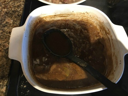 Gravy being made in a casserole dish.