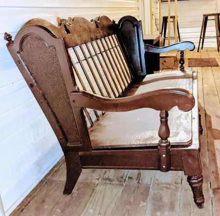 The frame of a wooden sofa.