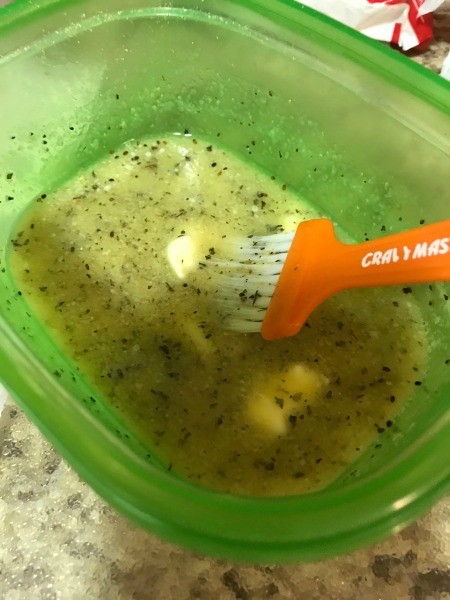 A melted butter and herb mixture.