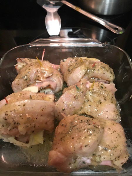 A baking pan of chicken cordon bleu.
