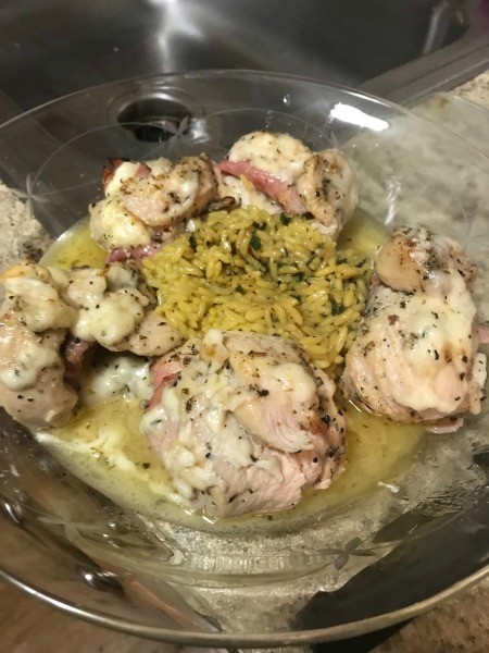 A plate of cooked chicken cordon bleu.