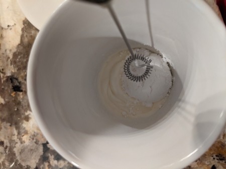 Using a frother in heavy cream.