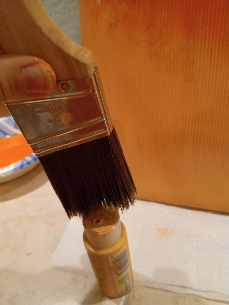 Sunset Mountain Painting - large brush dabbing top of paint bottle