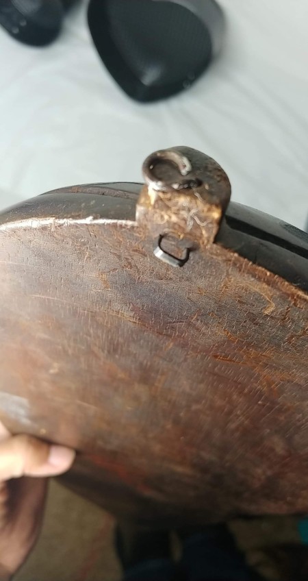 The back of a wooden mask.