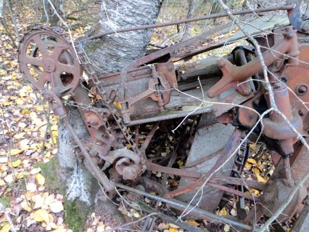 A piece of metal farm equipment.