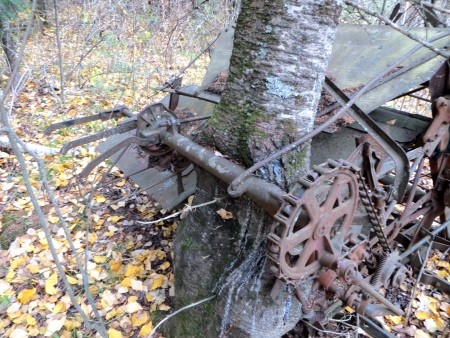A piece of metal farm equipment.