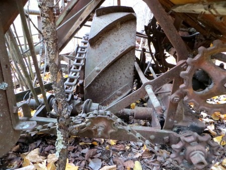 A piece of metal farm equipment.