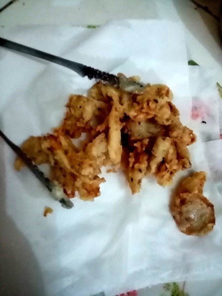 The fried mushroom chicharon on a towel.