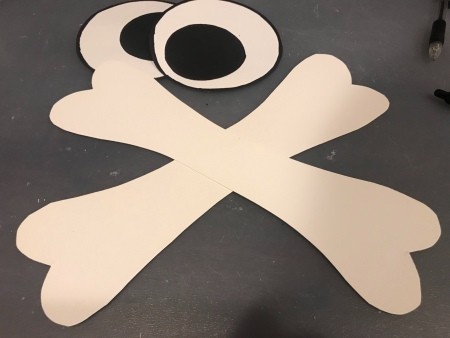 Halloween Sign - cardboard cut to resemble bones