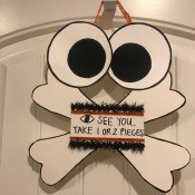 Halloween Sign - finished sign hanging on an over the door hook