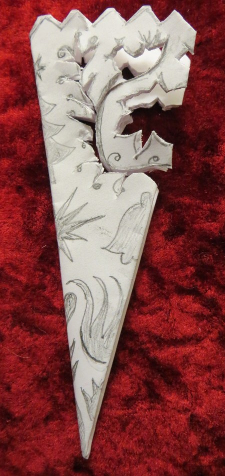 Fancy Paper Snowflake - carefully begin to cut out design