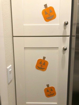 Pumpkin Wall Decoration - pumpkins glued to cabinet doors