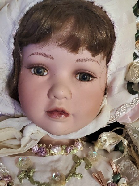 A close of up of the doll's face.