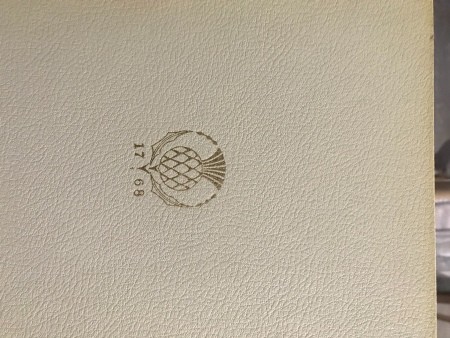 The embossed 1768 logo on a volume of Encyclopedia Britannica