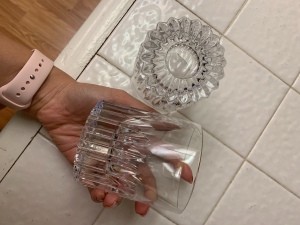 Two heavy glass drinking glasses.