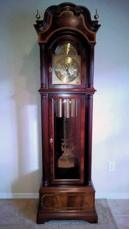 A wooden grandfather clock.