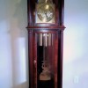 A wooden grandfather clock.