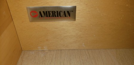 The American of Martinsville logo inside a drawer.