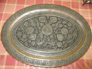 An ornate copper platter.