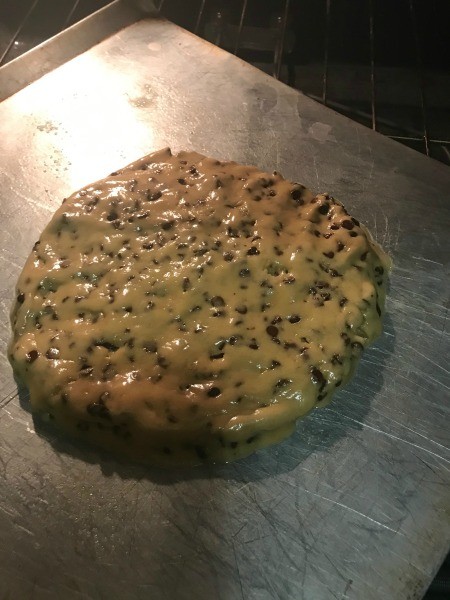 Baking the giant chocolate cookie.