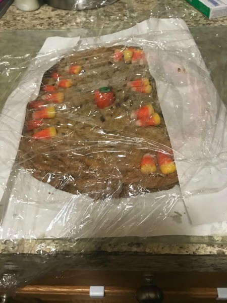 Wrapping up the giant chocolate cookie.