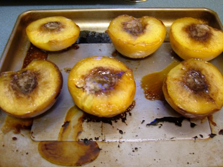 Baked Half peaches with butter and cinnamon sugar.