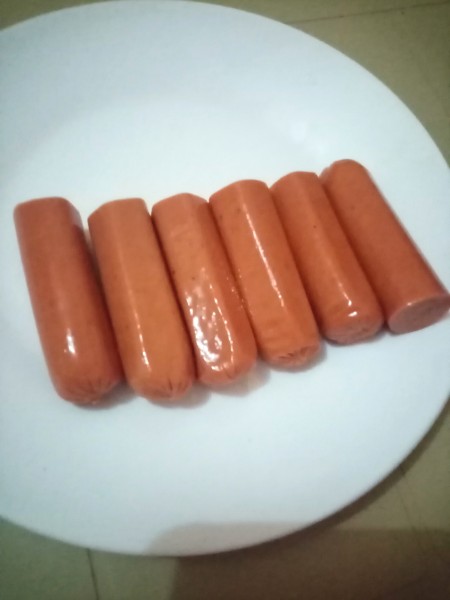 Small sausages on a plate.