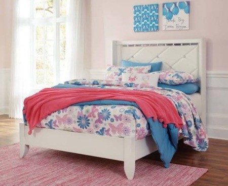 A white bed in an advertisement.