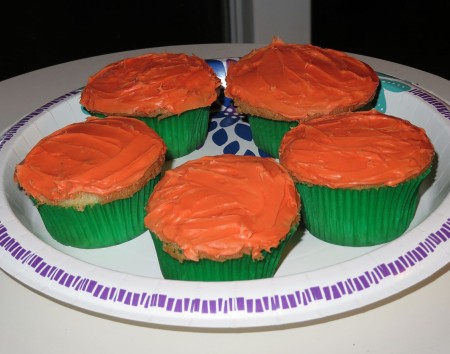 Cupcakes with orange icing.