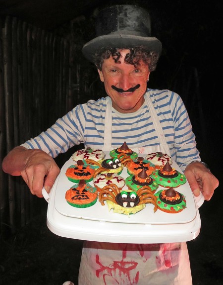 A plate of creepy Halloween decorated cupcakes.
