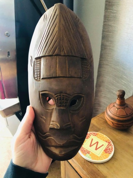 A carved wooden mask.