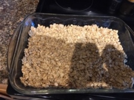 A pan of O Henry bars before adding the chocolate topping.