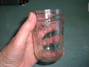 A clean glass jar with no label residue.