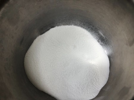 A mixture of baking soda and salt in a bowl.