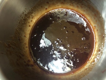 A red colored sauce for the wings.