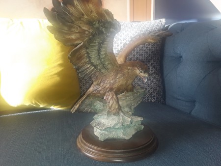 An eagle figurine.