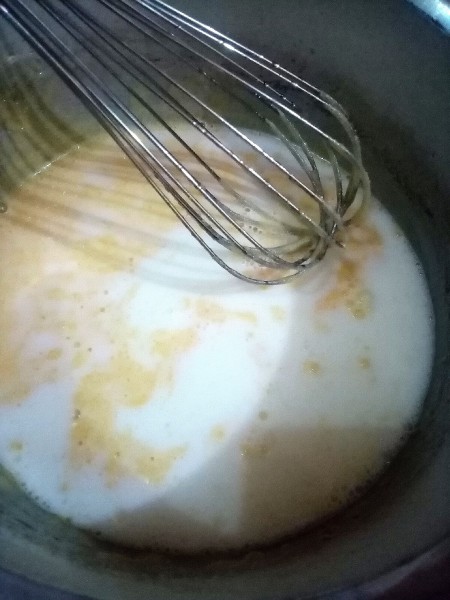 Mixing the sponge cake batter.