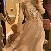 A G Armani statue of a Victorian woman.