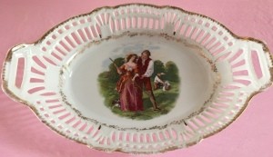 A decorative china tray or basket.