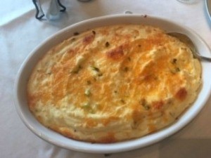 A pan of baked mashed potato casserole.