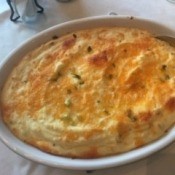 A pan of baked mashed potato casserole.