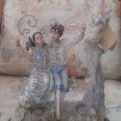A decorative figurine of a couple.