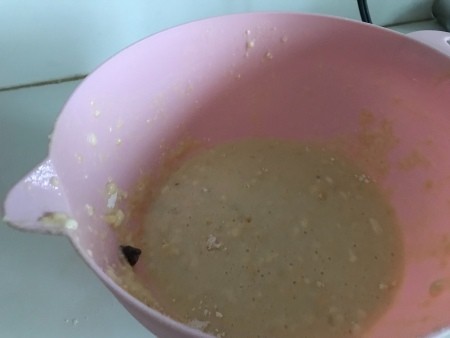 A bowl with waffle batter.