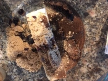 Mixing up the flavoring for the gingerbread Chex mix.