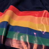 A rainbow stripe on a shirt.