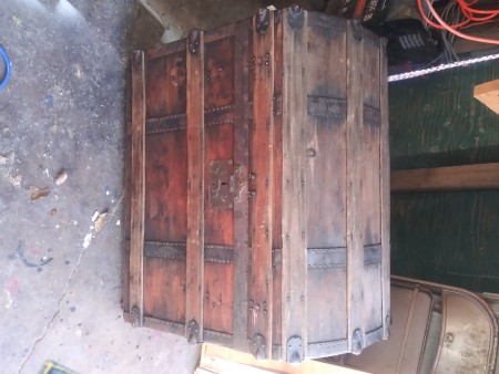 The back of a wooden chest.