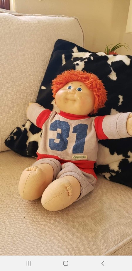 A red haired blue eyed Cabbage Patch doll.