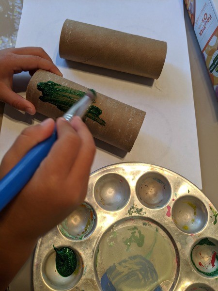 Christmas Dino Decoration - child painting TP tubes