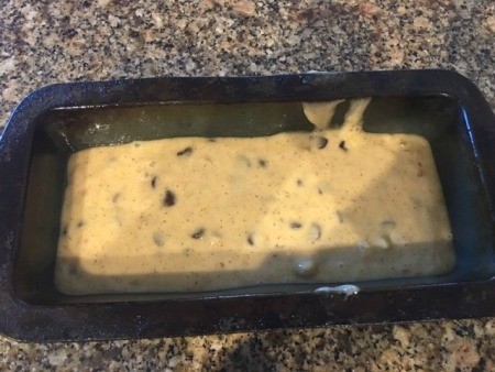 Pumpkin bread in a loaf pan.