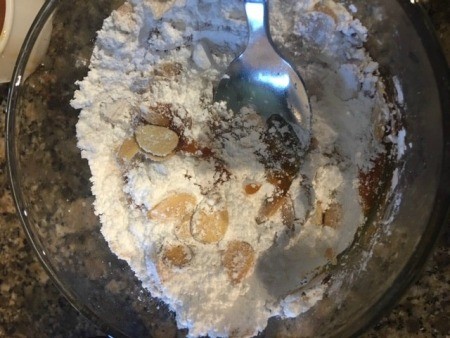 Mixing the ingredients in a bowl.